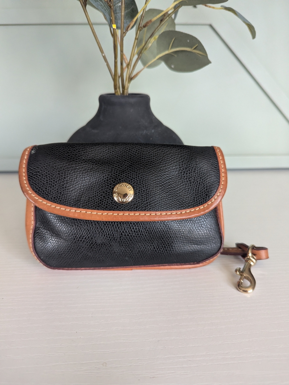 Dooney & Bourke Black Leather Small Wristlet with Tan Trim